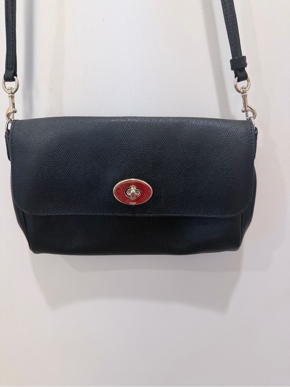 Coach Black Leather Crossbody with Gold Turnlock and Red Accent